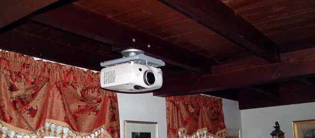 The projector is in place.  The distance to the screen is approx. 10½ ft.
